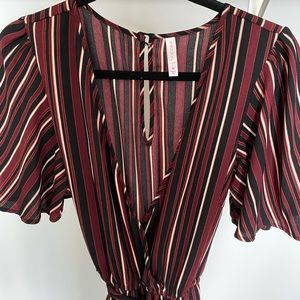 Red and black jumpsuit with wrap tie
